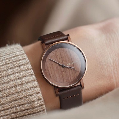 Walnut. A niche wooden watch with a simple Japanese-style retro design. It's a creative wooden men's watch